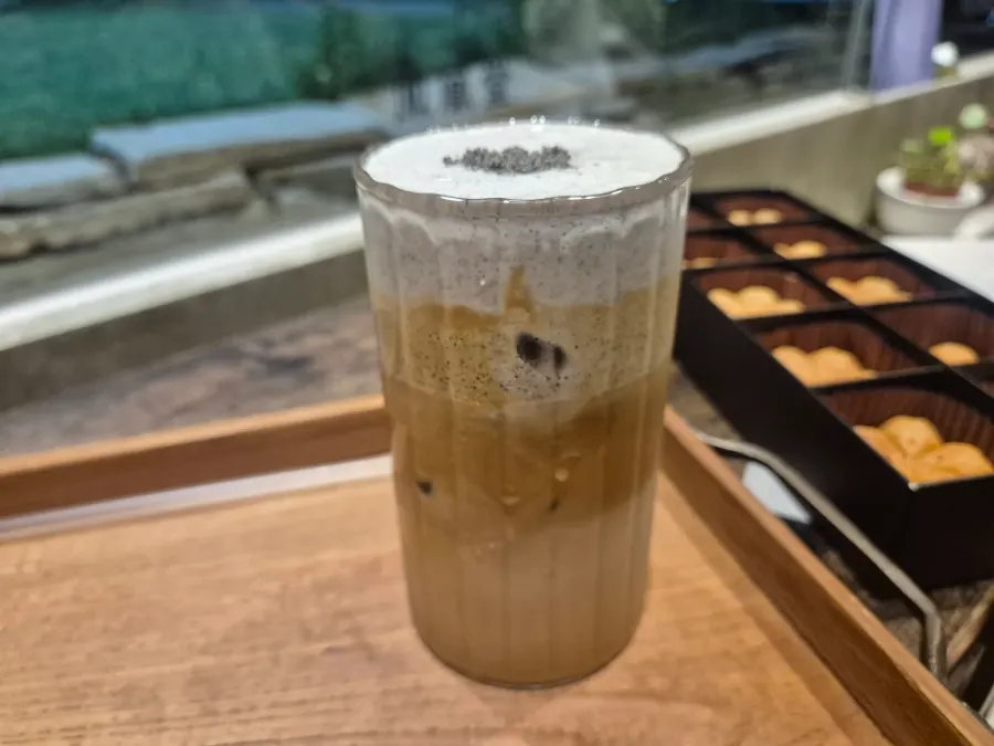 A cup of nutty black sesame cream latte