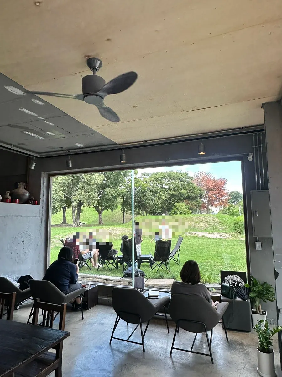 Outdoor camping chair seating at Cafe Bonghwangdang