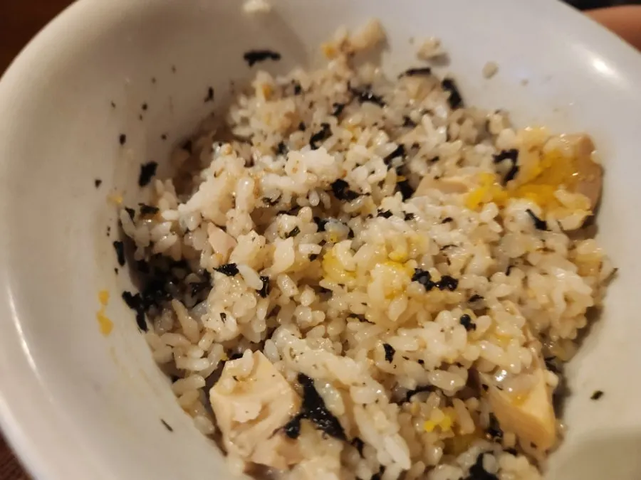 Egg rice mixed with seaweed flakes and sesame oil