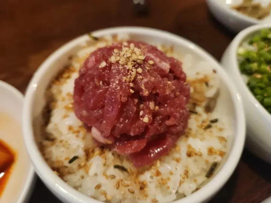 Beef tartare rice with raw beef on top at Dongyang Baekban