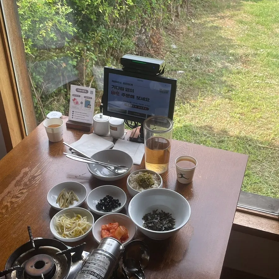 Plate of neatly arranged Korean side dishes