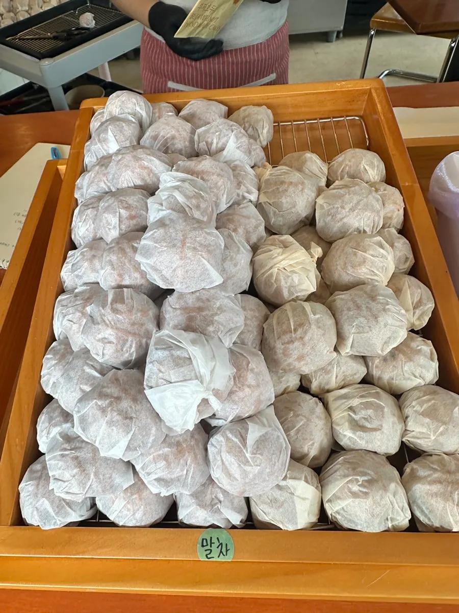 Walnut pastry counter inside Buja Hodu