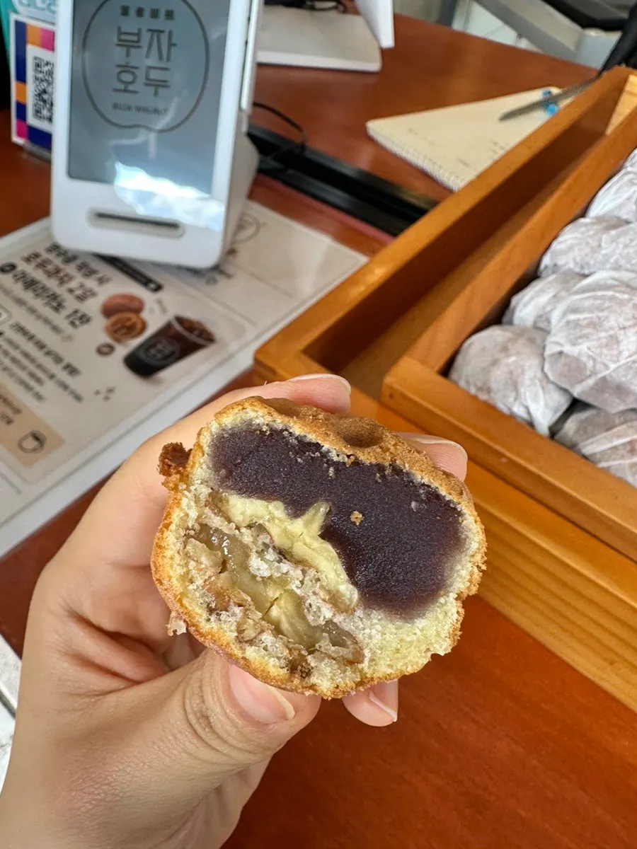Low-sugar red bean walnut pastry cut in half for tasting