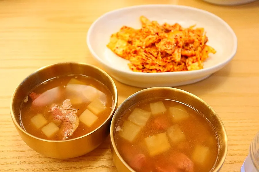 A bottle and glass of 11% Korean cheongju