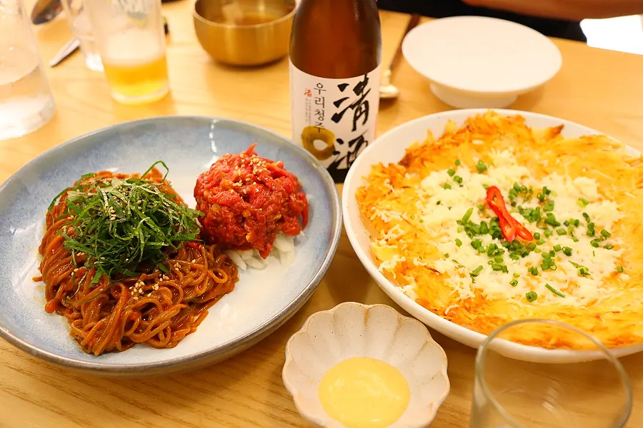 Yukhoe and perilla oil buckwheat noodles topped with perilla leaves