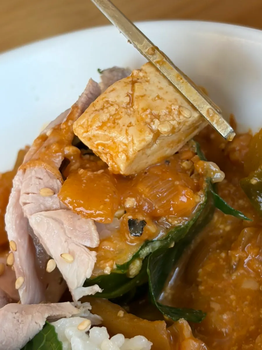 Cold jeyuk (pork) placed on top of doenjang ssambap
