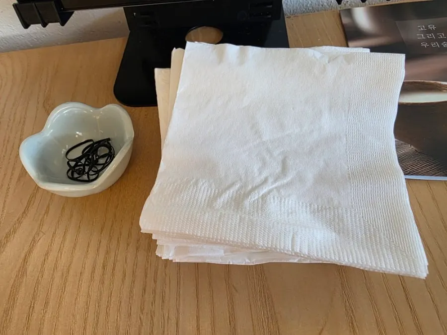 Napkins and hair ties provided at the table