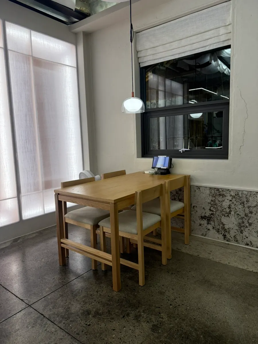 Full view of the clean interior tables at Goyu