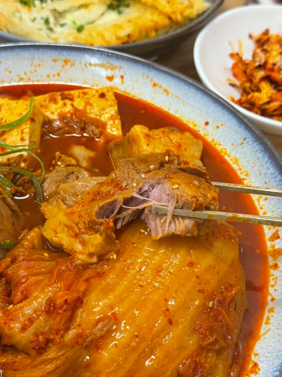 A big chunk of pork lifted along with kimchi