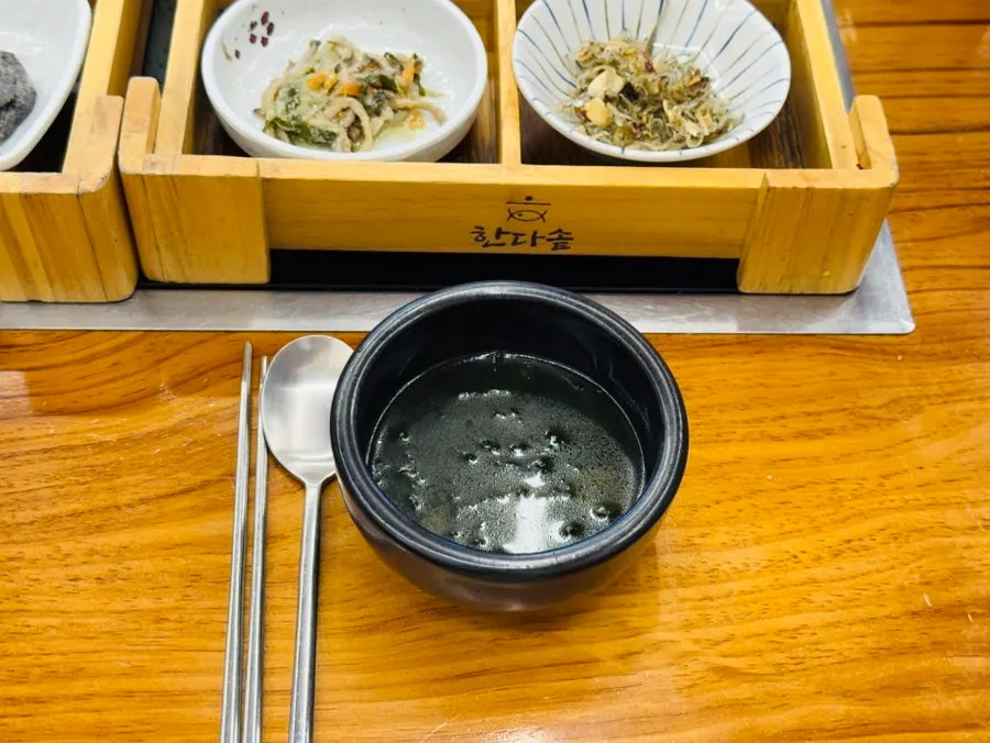 Eight side dishes in a wooden compartment box