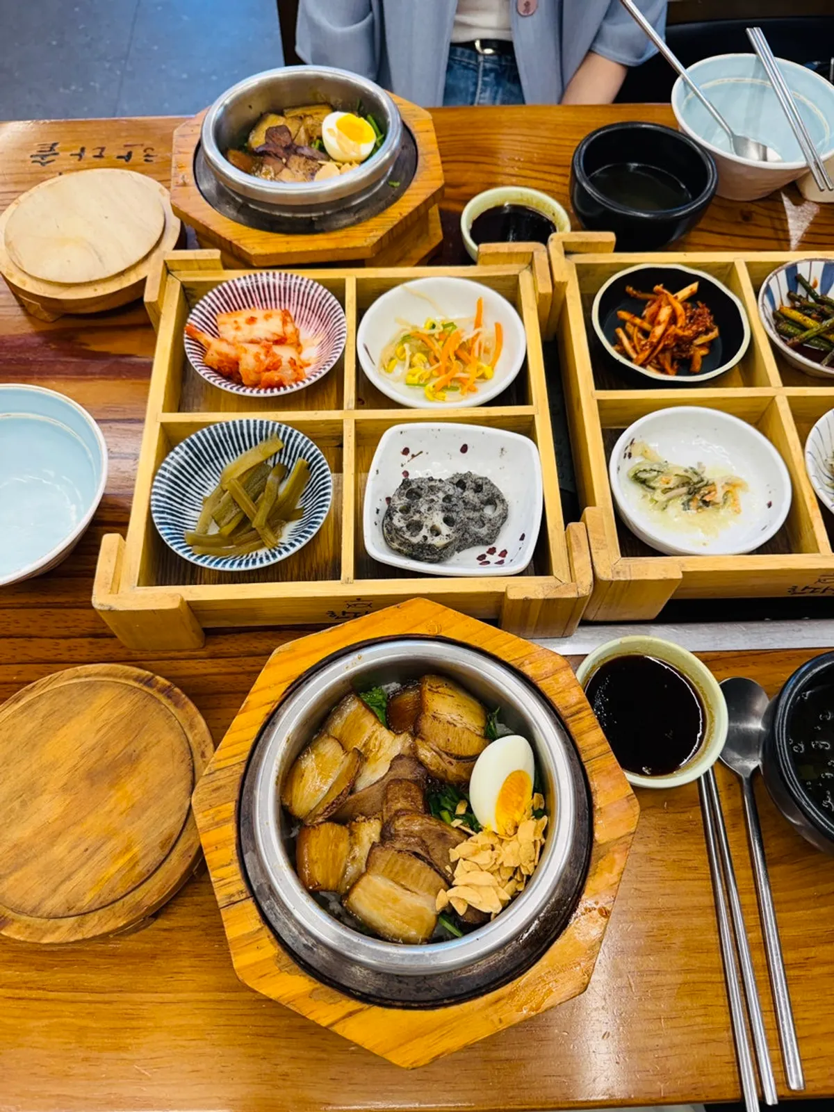 Solbap topped with soy-braised whole pork belly
