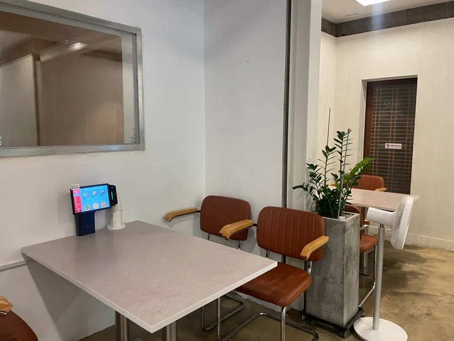 Widely spaced tables at Midam Kitchen