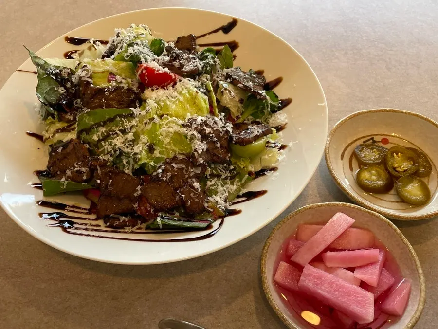 The three dishes we ordered laid out on the table at Midam Kitchen