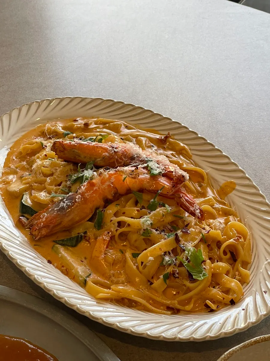 Toowoomba pasta topped with whole shrimp