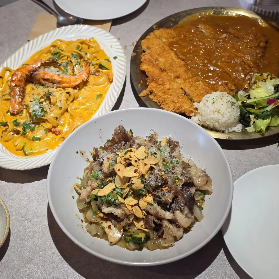 Table with beef brisket oil pasta, Toowoomba pasta and pork loin cutlet