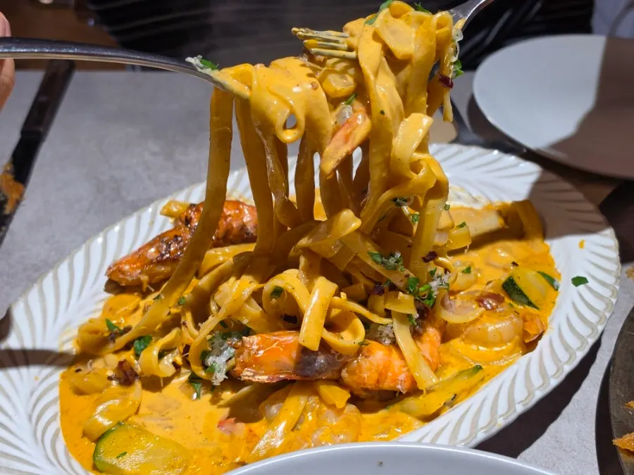 Close-up of Toowoomba pasta with zucchini and shrimp