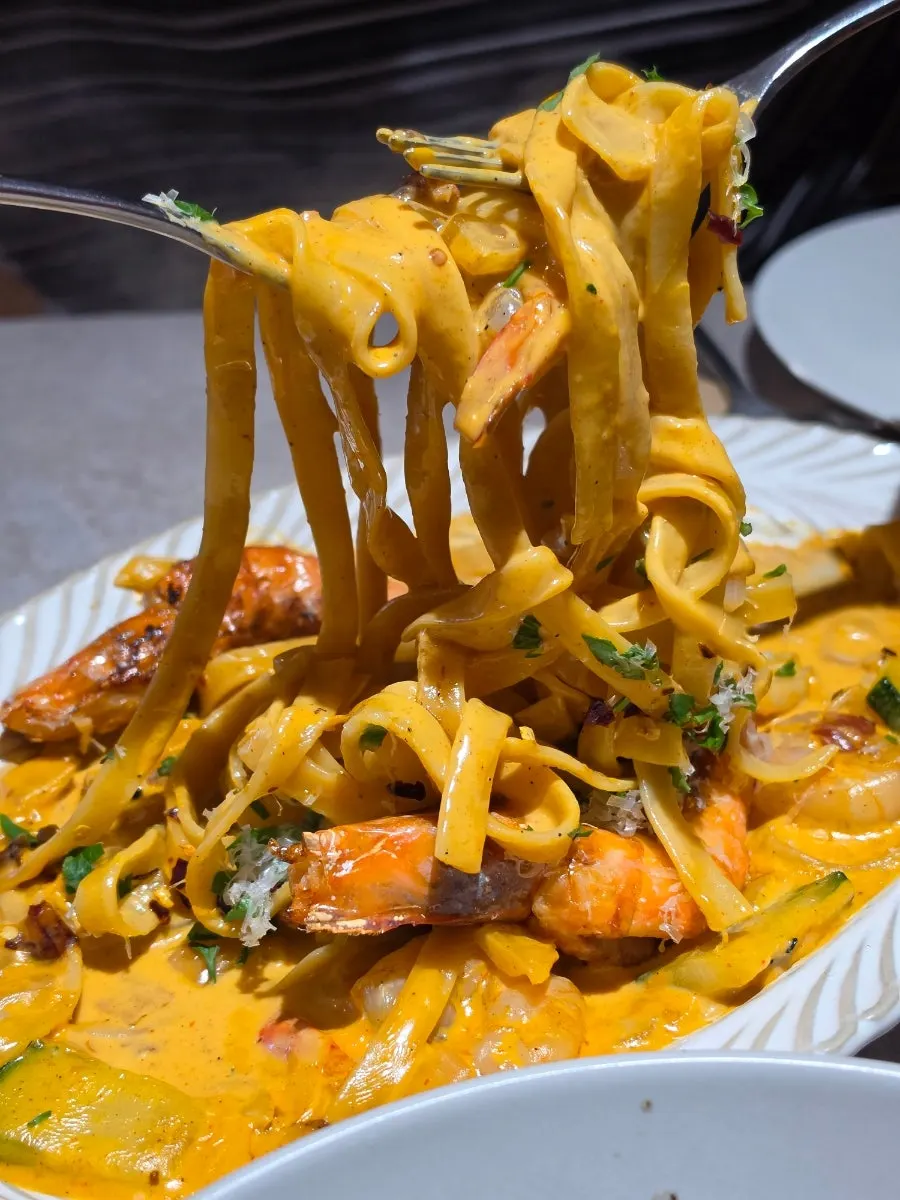 Remaining thick rosé sauce on the Toowoomba pasta plate