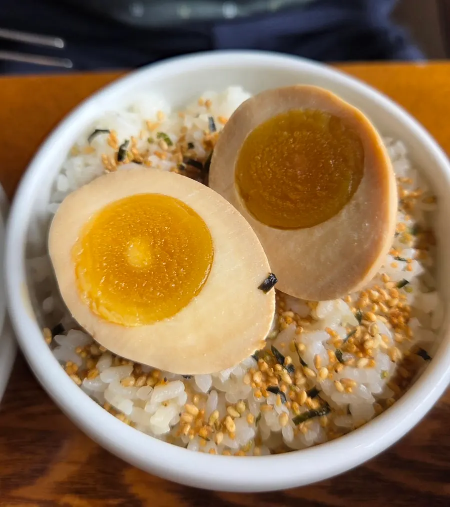 Egg rice topped with a soft-boiled yolk