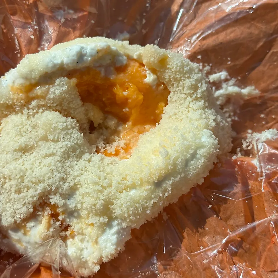 Cross-section of fig yogurt mochi with whole fruit inside