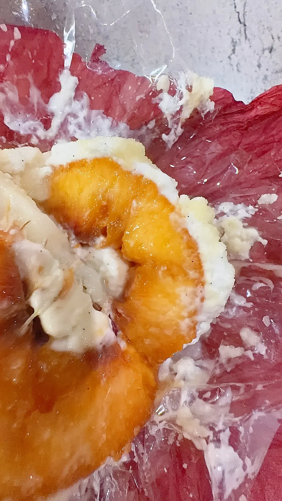 Peach mochi showing the low-sugar yogurt cream inside