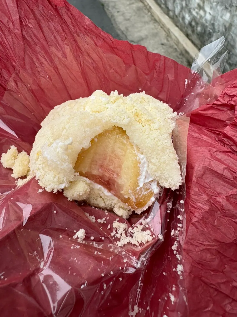 Cross-section of the mochi showing peach and yogurt cream