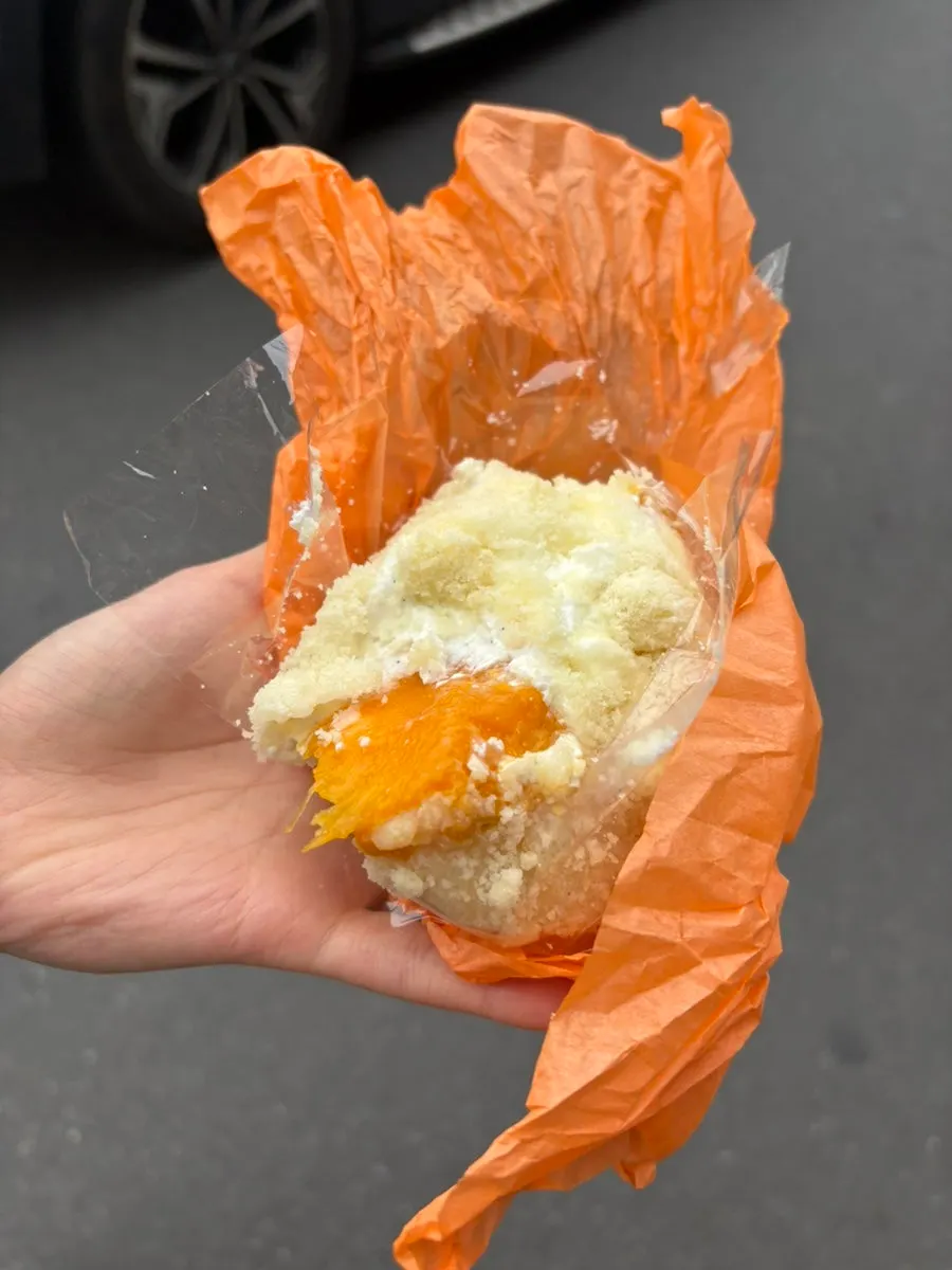 Mango yogurt mochi with a large piece of mango inside