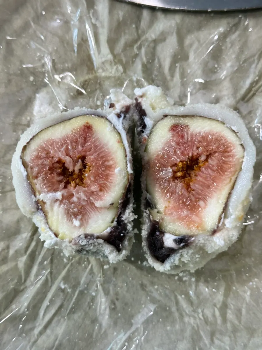 Cross-section of mochi with red bean, yogurt cream, and fig