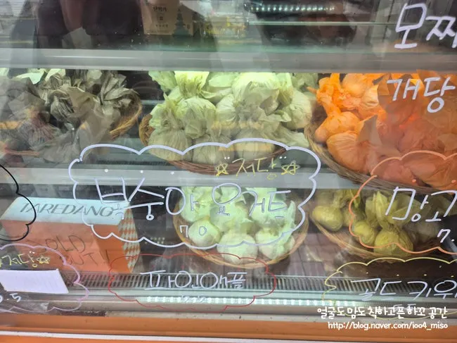 Inside the showcase with fruit mochi arranged by flavor