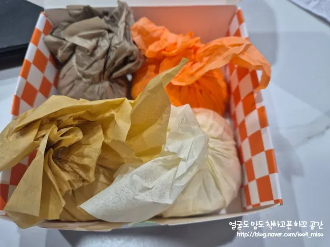 Four fruit mochi wrapped in colorful hanji paper