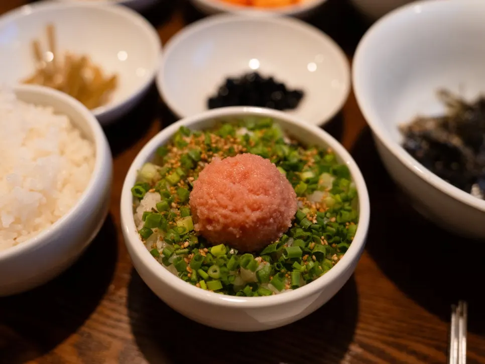 Pollack roe rice bowl topped with scallions and pollack roe