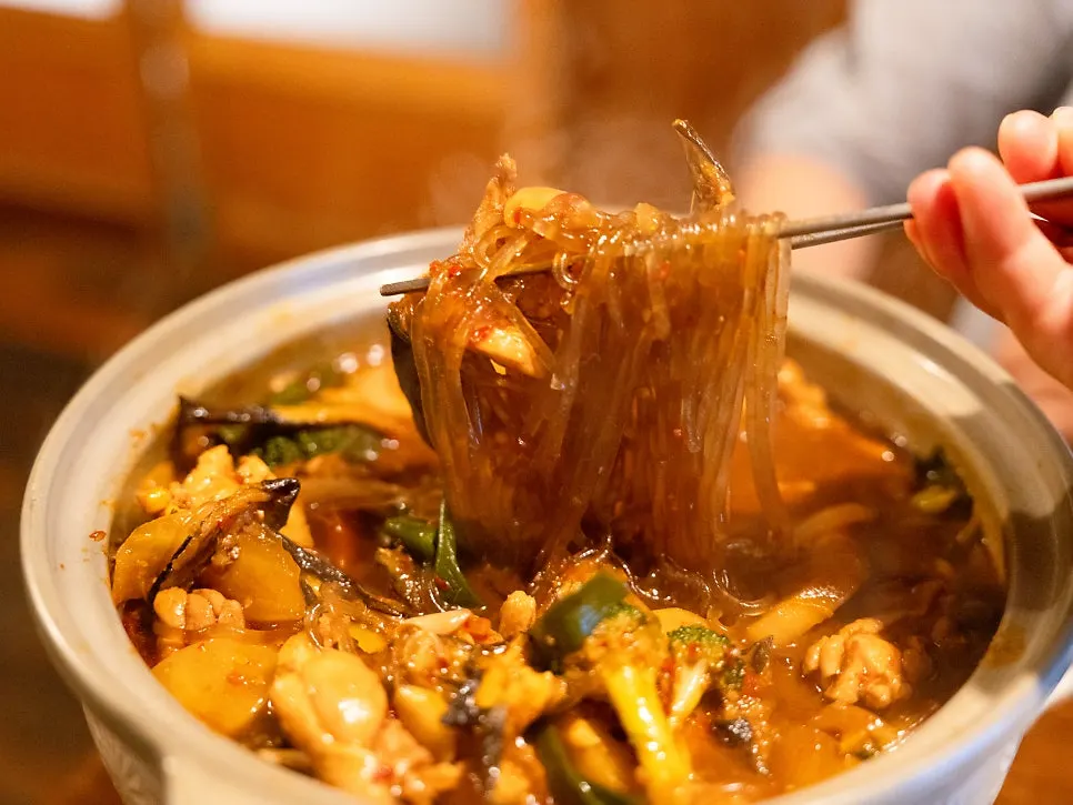 Glass noodles and sujebi inside the jjimdak