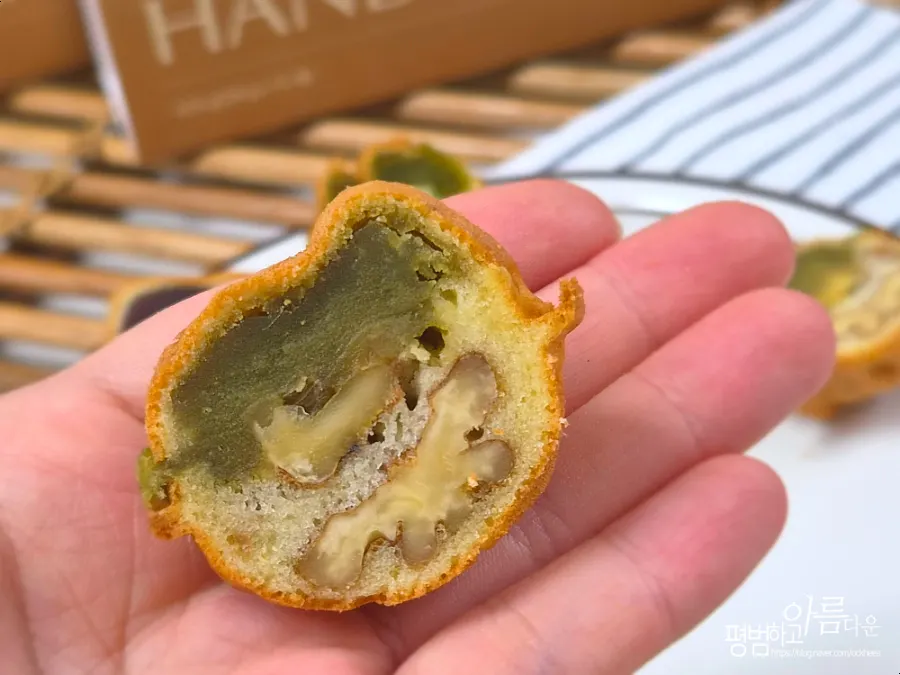Cross-section showing pea paste, cream cheese, and a whole walnut
