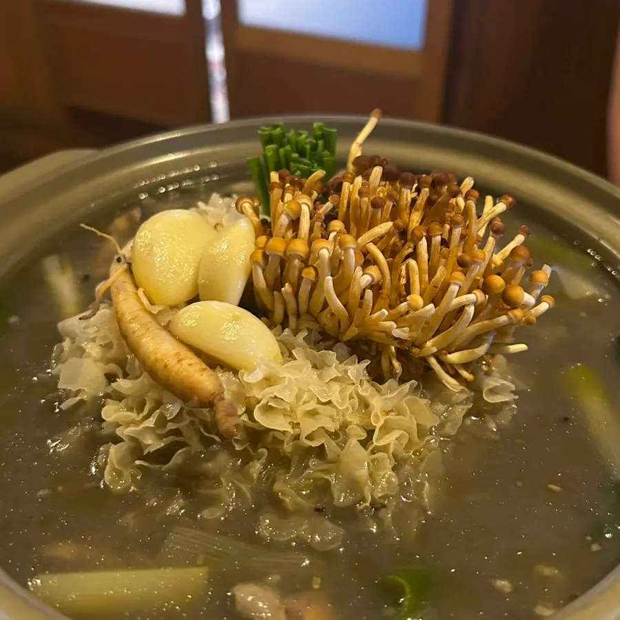 Full table setting of the eunyi mushroom nurungji chicken stew