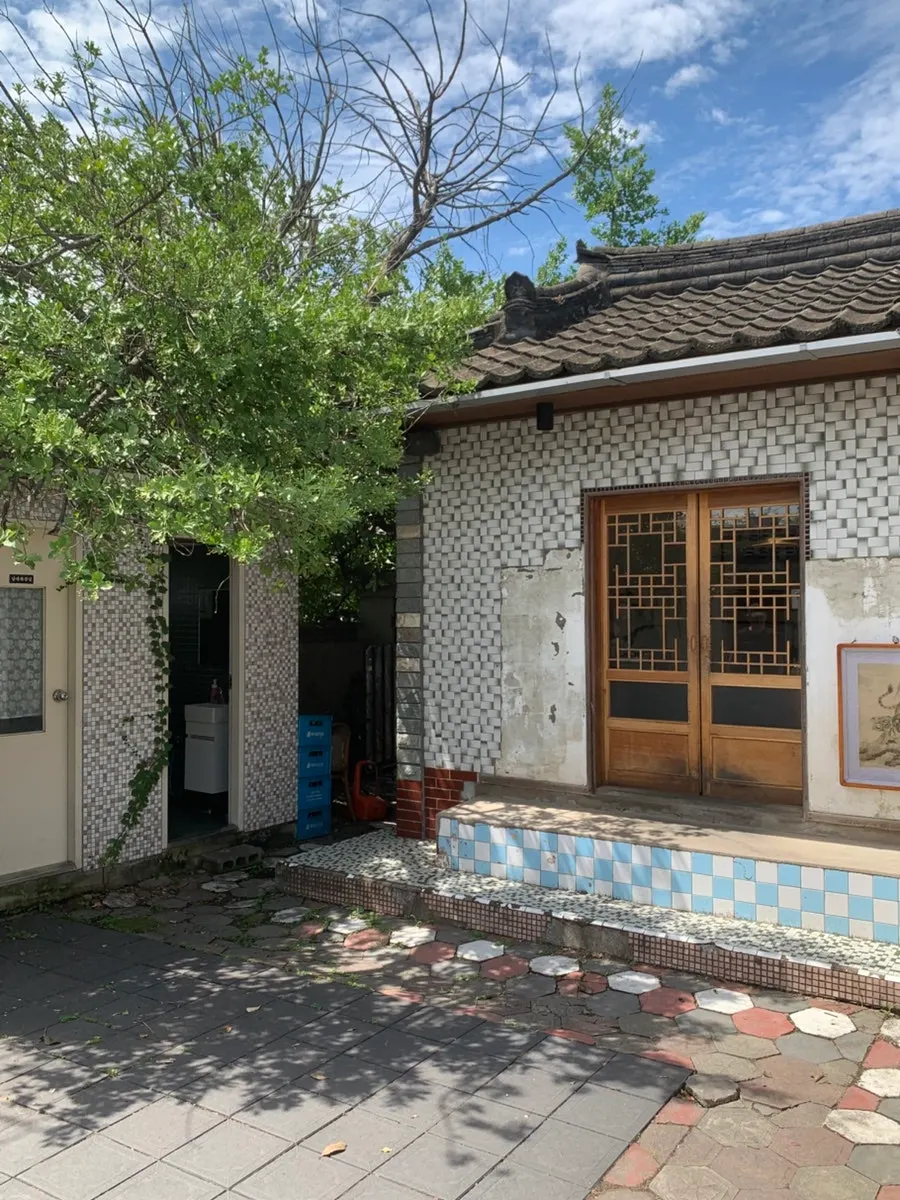 Quiet hanok exterior entrance of Dongyang Baekban