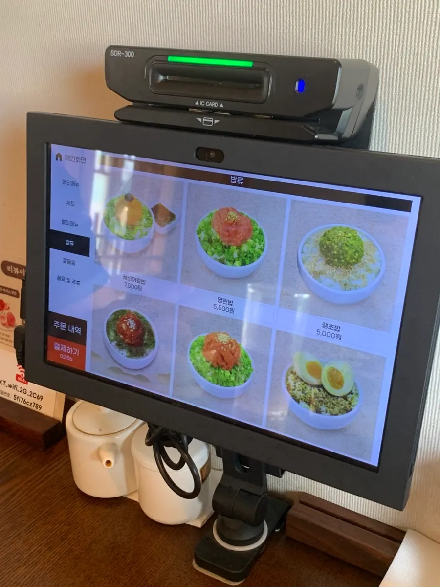 Menu showing rice options and size-based pricing