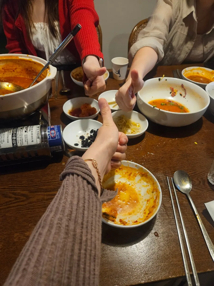 Dinner table set with tripe hot pot and pollock roe rice together