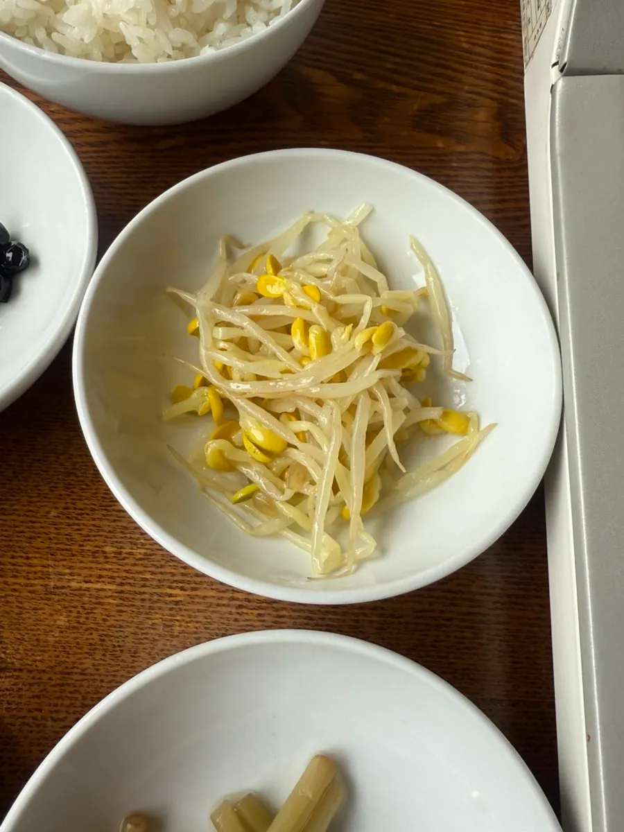 Table set with four types of side dishes