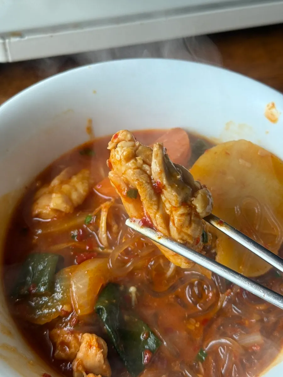Fluffy, well-cooked potatoes in the chicken stew