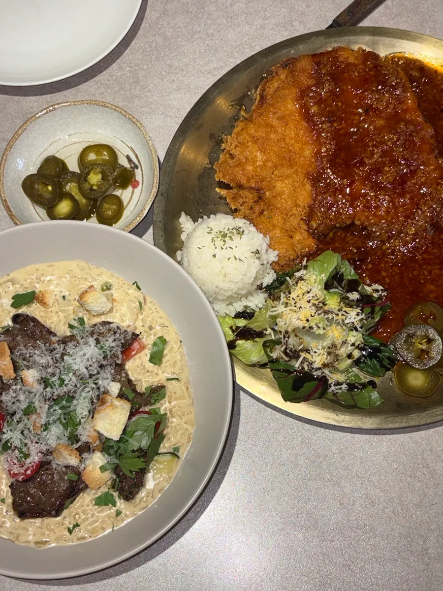Risotto and pork cutlet served together