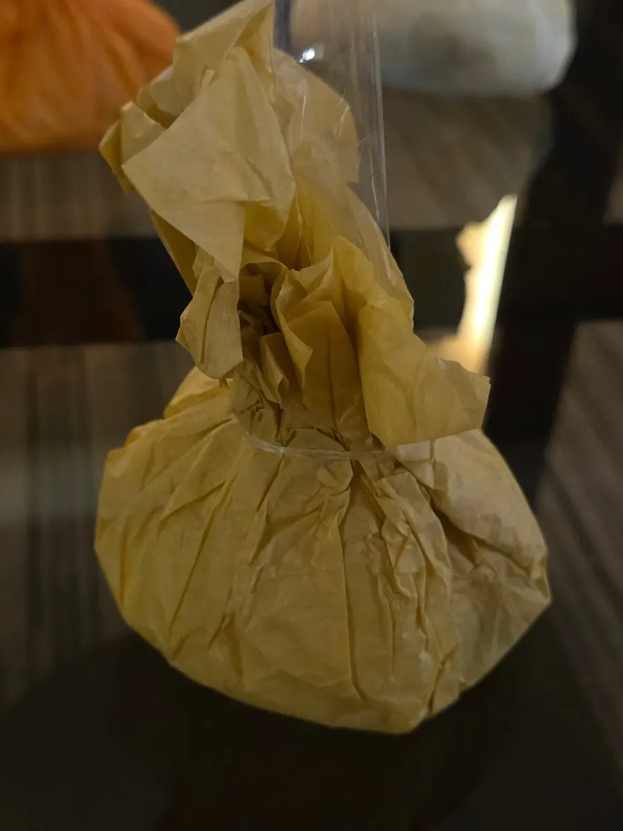 Gold kiwi mochi with wrapping removed