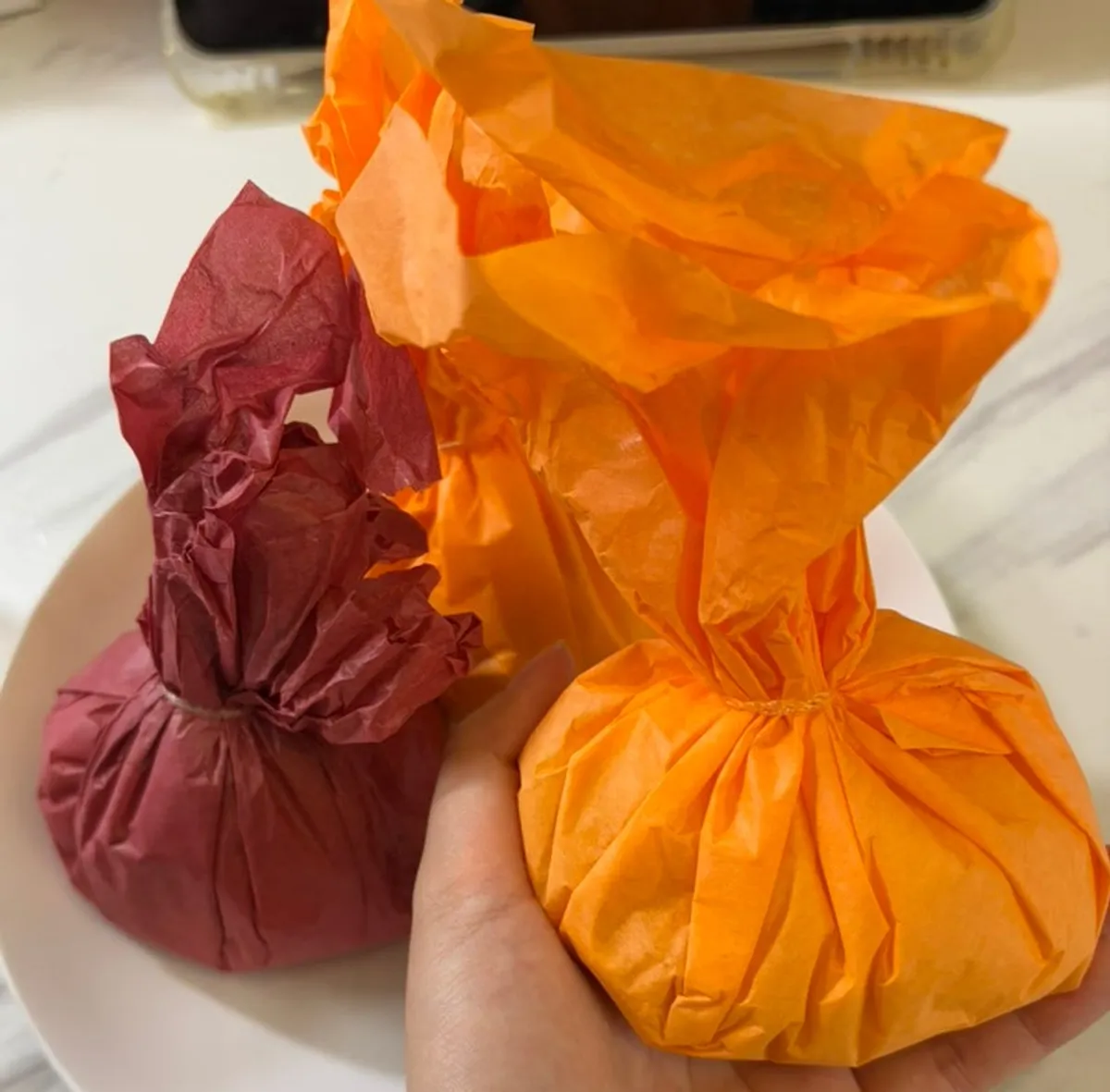 Oversized fruit mochi packaging opened at home