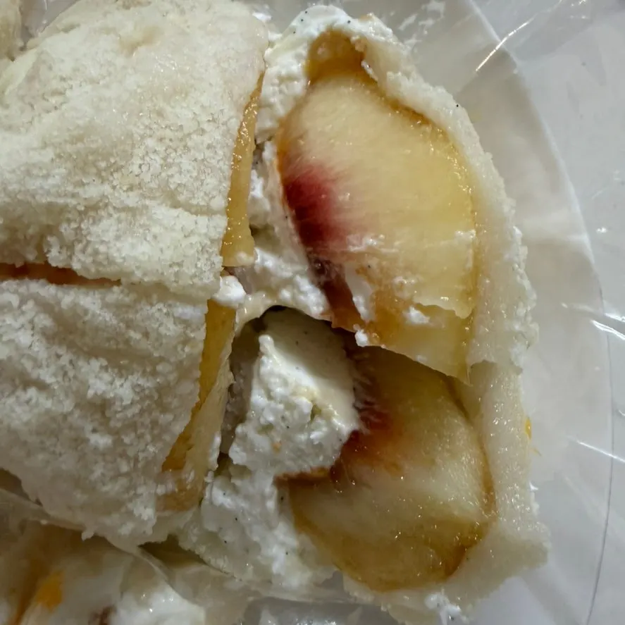 Peach mochi cut in half