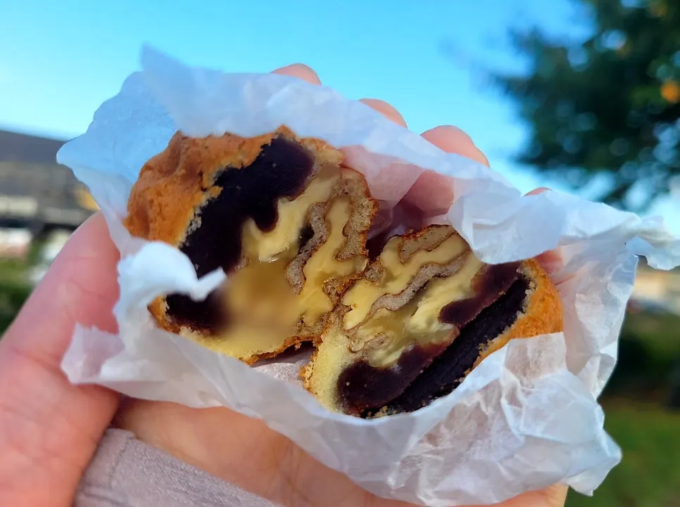 Cross-section of red bean walnut pastry packed with walnuts