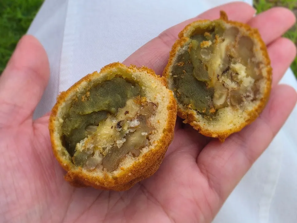 Cross-section of a matcha filling walnut pastry