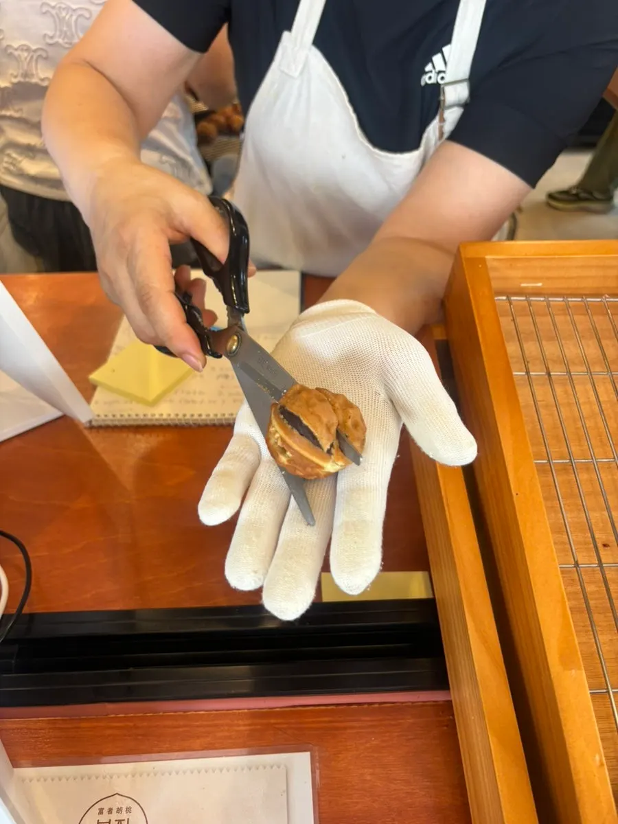 A walnut pastry with a whole walnut baked inside