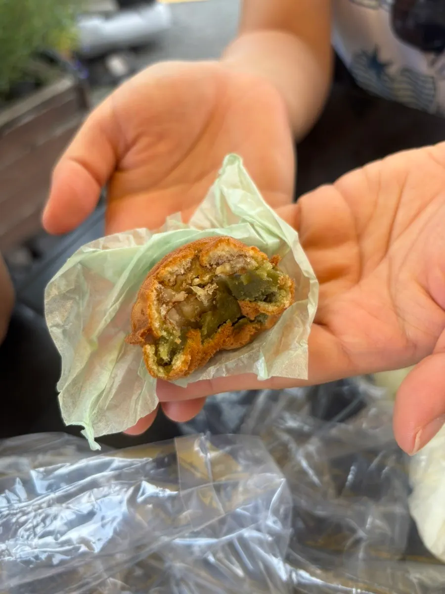 A rice-dough walnut pastry split in half