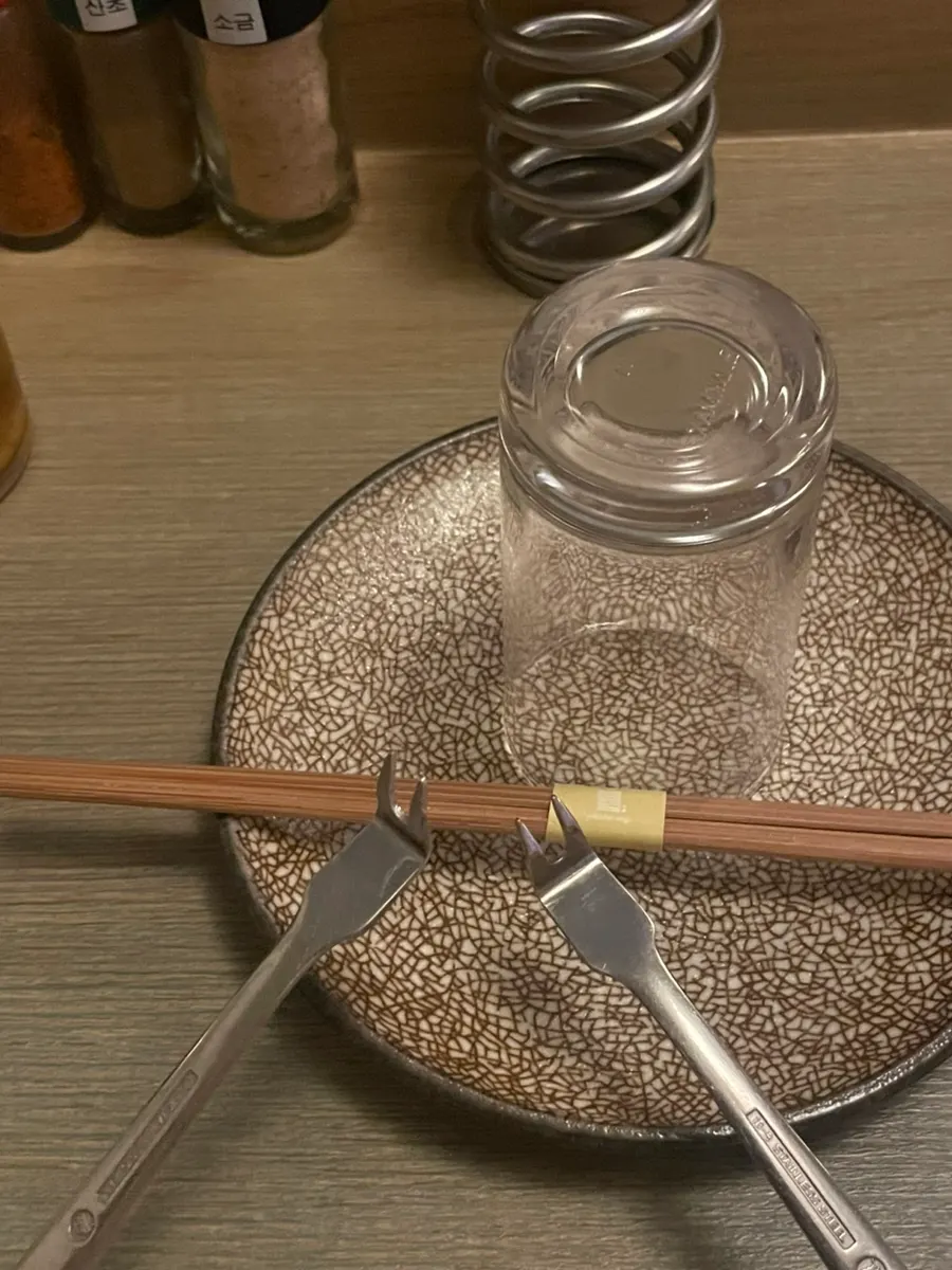 Table setting with fork made for pulling skewers