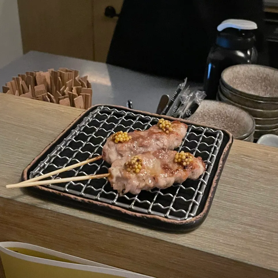Freshly grilled yakitori skewers