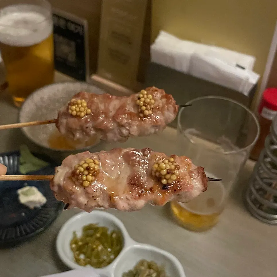 Tsukune skewers made of minced grilled chicken