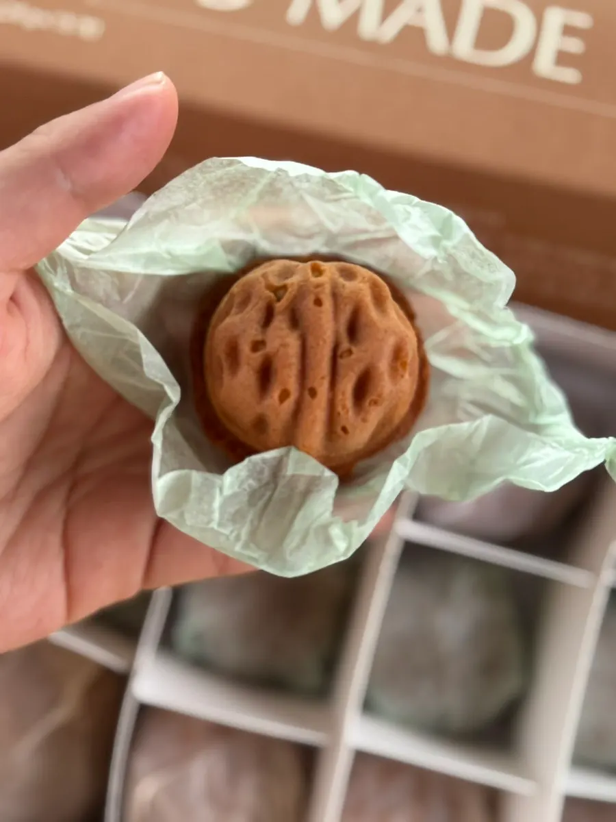 Inside of the matcha walnut pastry filled with cream